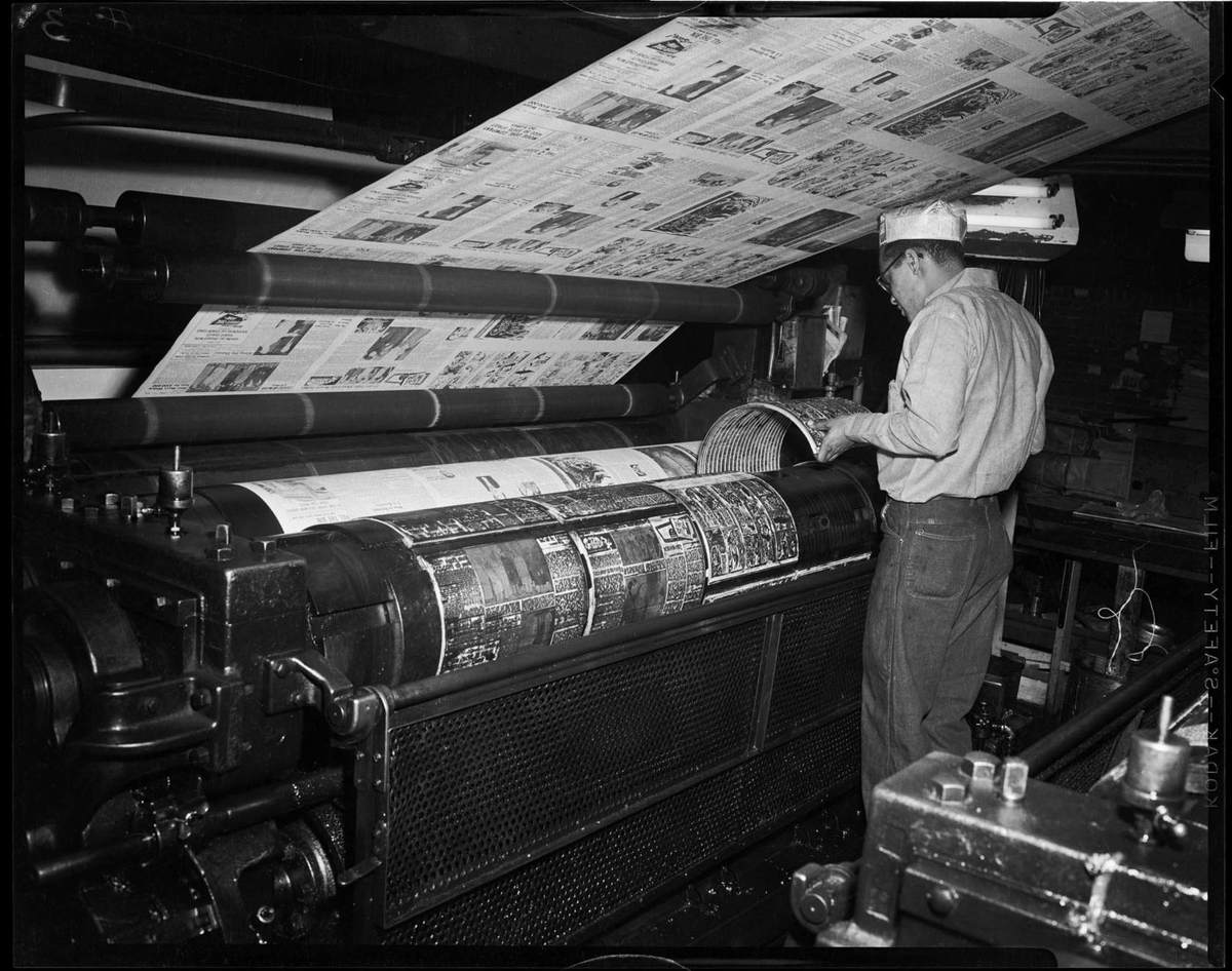 Pittsburgh Courier newspaper press operator, possibly William Brown, possibly printing Chicago or other Midwestern edition
